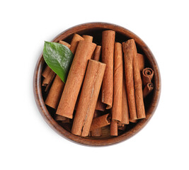 Cinnamon sticks and green leaf in bowl isolated on white, top view