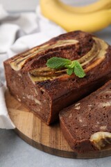 Delicious banana bread on grey table, closeup