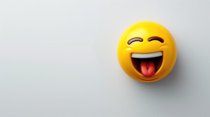 Fototapeta premium Laughing emoji icon with a tongue out