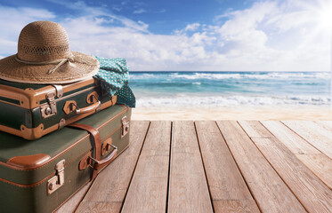 Vintage style suitcases at the beach