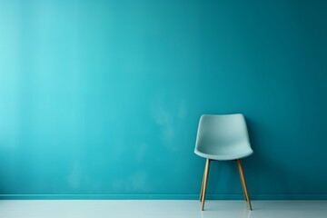a chair against a blue wall