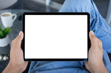 male hand hold computer tablet with isolated screen in cafe