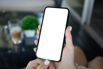 woman hand hold phone with isolated screen background cafe office