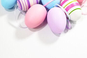 Colorful Easter Eggs on white background copy space stock photo