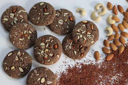 Ragi Cookies or Finger Millet Cookies. Delight in wholesome goodness with these delectable finger millet cookies topped with almonds and cashews