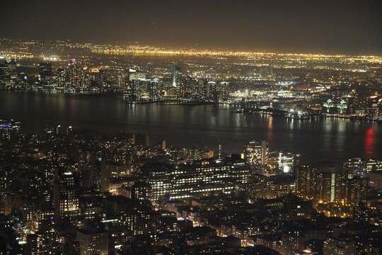 view to skyline of New York with East river and Hudson in background.