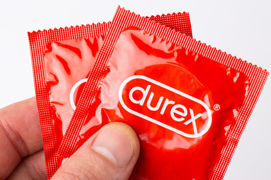 A picture of a red condom package of the brand Durex.