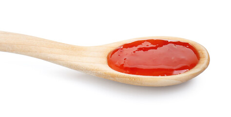 Spicy chili sauce in spoon isolated on white