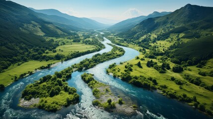 Picturesque river winding through a lush valley, vibrant green foliage along the banks, clear blue water, idyllic and inviting, Photography, aerial sh - obrazy, fototapety, plakaty