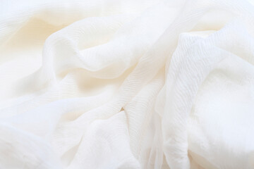 Wavy abstract white silk background.