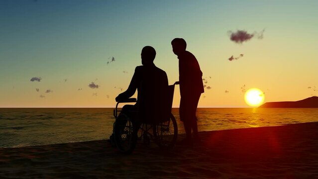 Elderly couple watching the sea and sunset at the beach