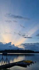 Fototapete Bereich Sunbeams over a lake in sweden