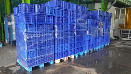 Blue clean basket on the pallet after cleaning process cover with plastic to keep it clean