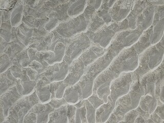 Sand des Wattenmeeres mit Wellenmuster