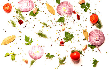 Background from spices and seasonings. Culinary screensaver. Spices and vegetables on a white background. Flat lay.