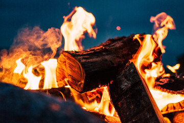 night campfire on a rocky coastline of saaremaa, estonia