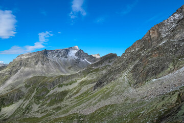 Fototapeta na wymiar Panoramic view of majestic mountain peak of Gamskarlspitz in High Tauern National Park, Carinthia, Austria. Idyllic hiking trail in Austrian Alps. Hike paradise Mallnitz. Wanderlust in summer. Escape