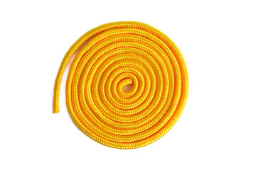 Yellow skipping rope for rhythmic gymnastics. Static nylon cord isolated on a white background.