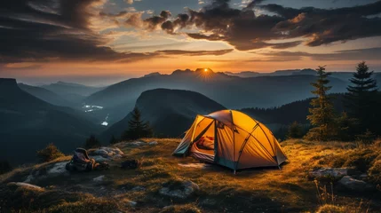 Schilderijen op glas Campsite in a remote area at dawn, tent set up with a view of mountains in the distance, conveying the peacefulness and beauty of camping in nature, Photorealis © ProVector