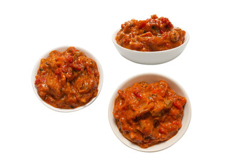 Vegetable stew in a bowl isolated on white background.