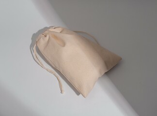 Natural textile bag with strings. Organic eco fabric sack. Linen and cotton canvas pack