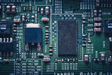 Electronic board with microchips in closeup.