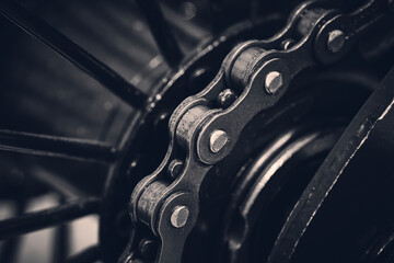 Bicycle chain is attached to rear sprocket. - obrazy, fototapety, plakaty
