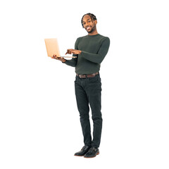 Full body photo of a black man using a laptop. Full body photo PNG with transparent background precisely cut out with clipping path.