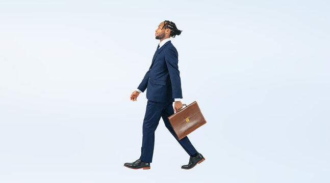 Full body photo of a walking black businessman. (We also sell PNGs that are cropped and have transparent background. Please search for "PNG" from the creator link.)