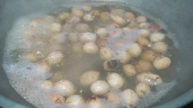 the process of cooking boiled Bogor peanuts (Bambara groundnuts) which are soaked in water until boiling