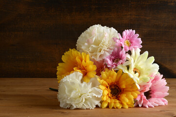 bouquet of flowers on a wood table - 739316275