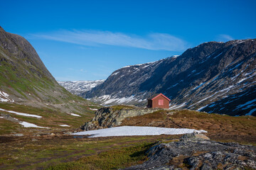 Fototapeta na wymiar The snow capped Breiddalen Valley at Jotunheimen National Park in Norway,