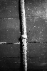 Iron band on a vintage wood in black and white.