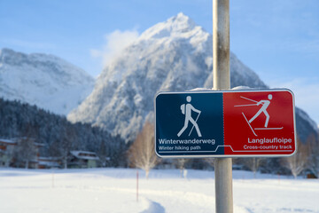 Traffic sign marking the cross-country ski trail and winter hiking path