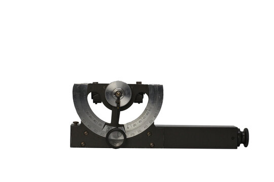 Vintage metal measuring instrument clinometer, inclinometer, for calculating degrees, angles, slope, elevation , isolated image .