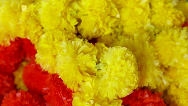 Indian flower garland of mango leaves and marigold flowers. For marriage and festivals. Traditional Diwali sweets festival in India
