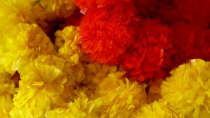 Indian flower garland of mango leaves and marigold flowers. For marriage and festivals. Traditional Diwali sweets festival in India