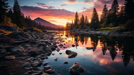 Fotobehang A serene alpine lake at sunset, the sky ablaze with colors, the silhouettes of pine trees framing th © ProVector