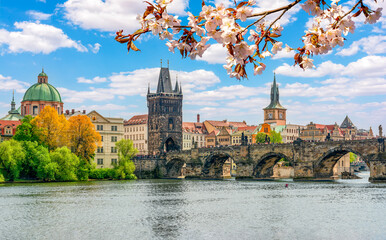 Prague cityscape with Old Town bridge Tower and Charles bridge over Vltava river in spring, Czech...