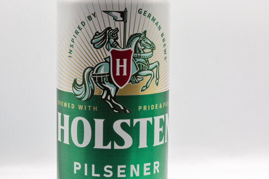 Holsten beer can label closeup against white.