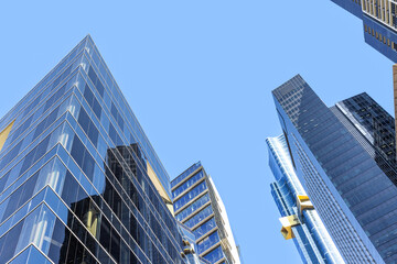 Melbourne city skyscrapers in the Southbank district, against a clear blue sky.