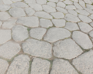 background of stones of an old roman road near Rome