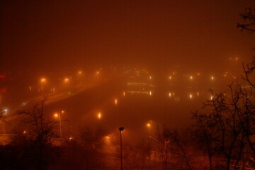 Foggy winter night in Prague with bridge, Czech Republic