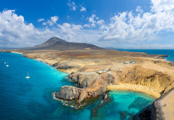 Papagayo Beach, Lanzarote: A stunning beach with golden sand, turquoise waters, and secluded coves.
