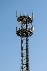 Fototapeta na wymiar 5G 4G tower connection station internet radar blue sky