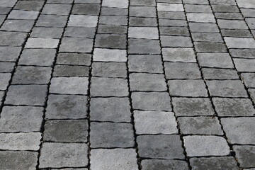 gray paving slabs as a background, pavement paved slabs as a background