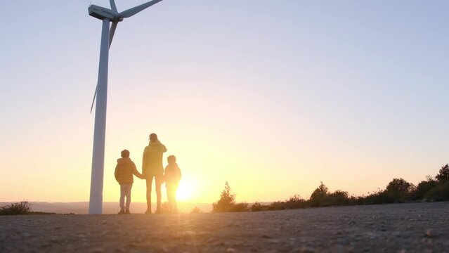 A heartwarming portrayal of a single mother guiding her two sons towards a sustainable future. Exploring green technology, wind turbines, and environmental conservation. 