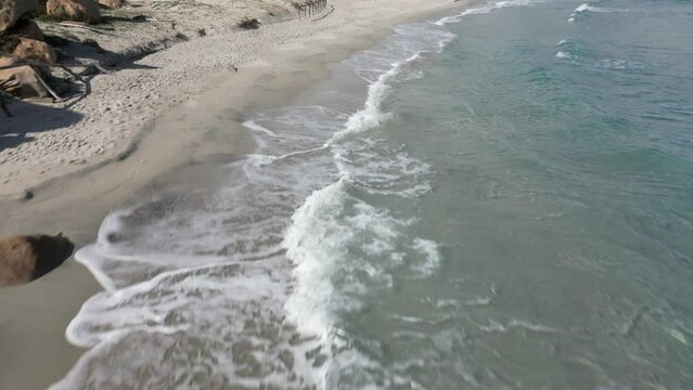 Aerial image of the sea of ​​Sardinia, Villasimius.
Crystal clear sea and clouds