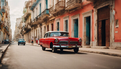 retro red car on a sunny street in havana, cuba
