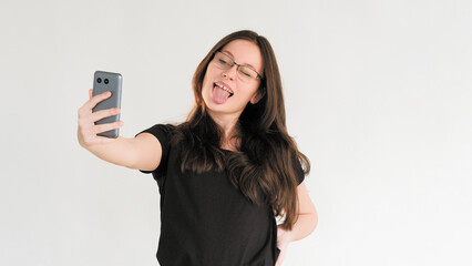 Fun selfie gadget people playful woman photo phone